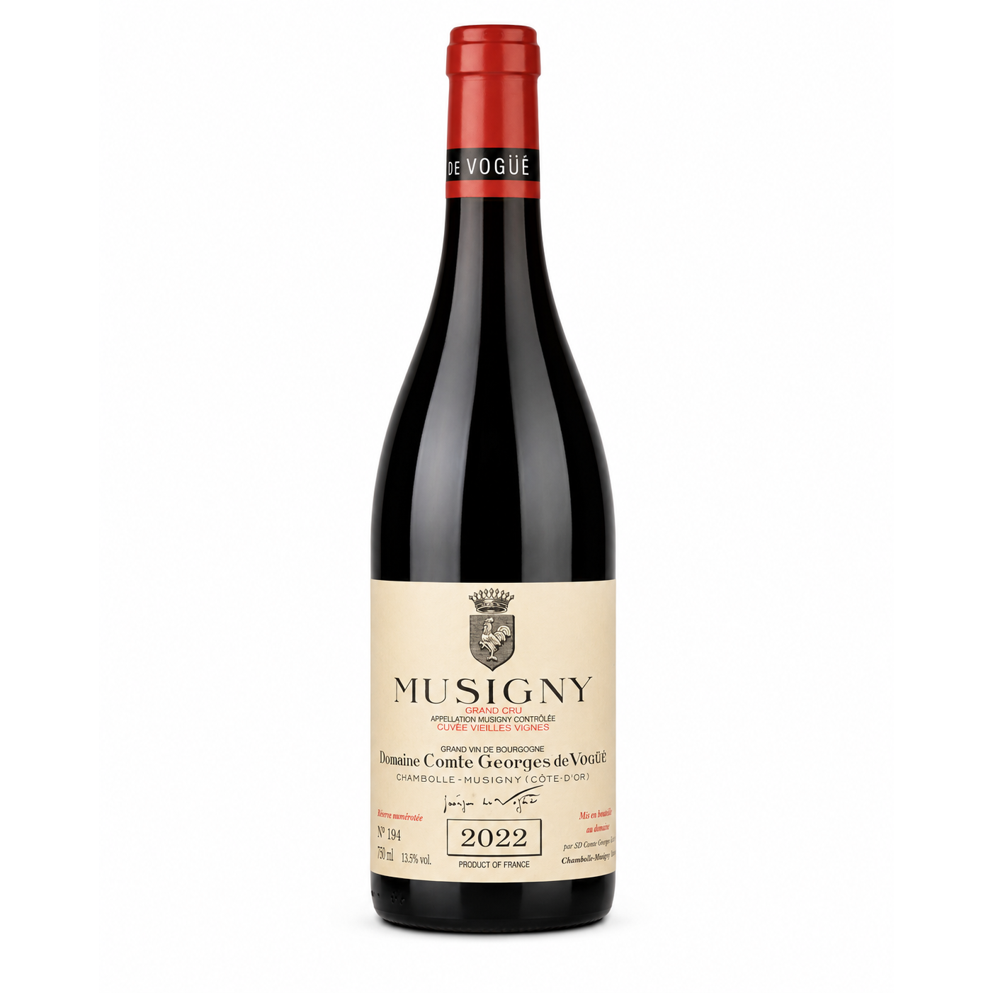 A bottle of Musigny red wine from Domaine Comte Georges de Violette, featuring a dark glass bottle, a cream-colored label with black text, and a red foil capsule at the top, set against a plain white background.