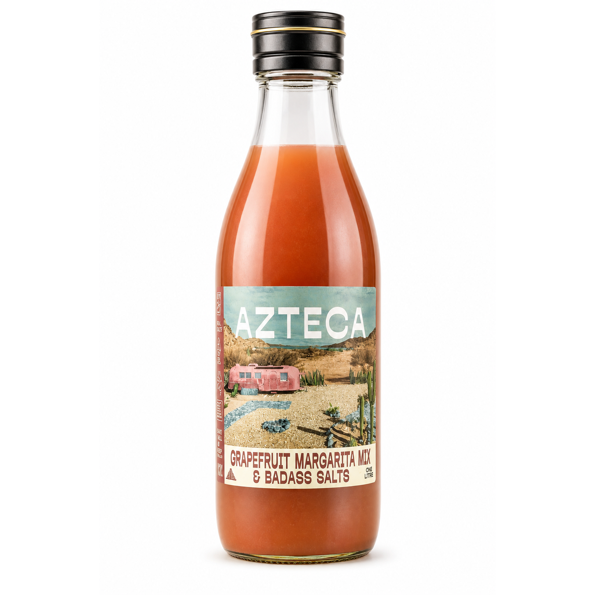 A bottle of Azteca Grapefruit Margarita Mix & Badass Salts on a clean white background. The clear glass bottle shows the orange-red liquid inside, topped with a black cap and featuring a colorful retro-style label with a desert scene and pink camper.