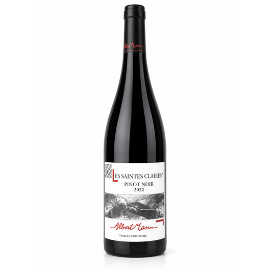 A bottle of Albert Mann Les Saintes Claires Pinot Noir 2022 wine, featuring a black glass bottle with a white label and red script details, set against a plain white background.