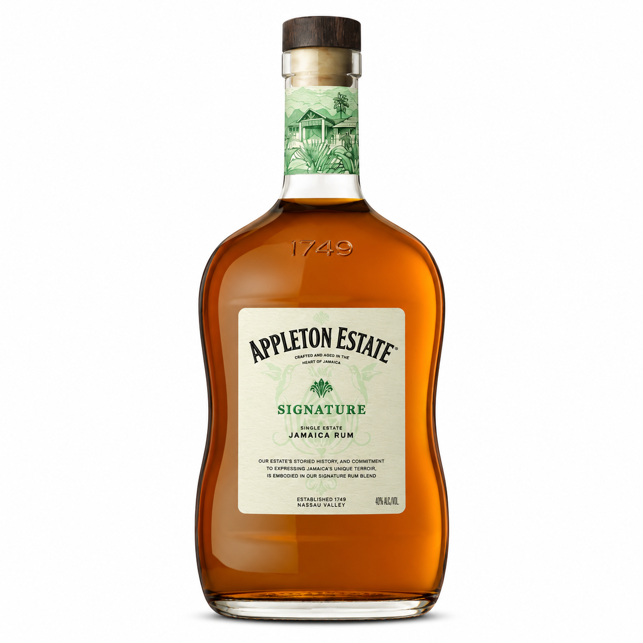 A bottle of Appleton Estate Signature Jamaican Rum whiskey on a clean white background. The bottle is filled with amber liquid and features a cream-colored label with green and black text, a dark brown cap, and a green illustrated neck label.