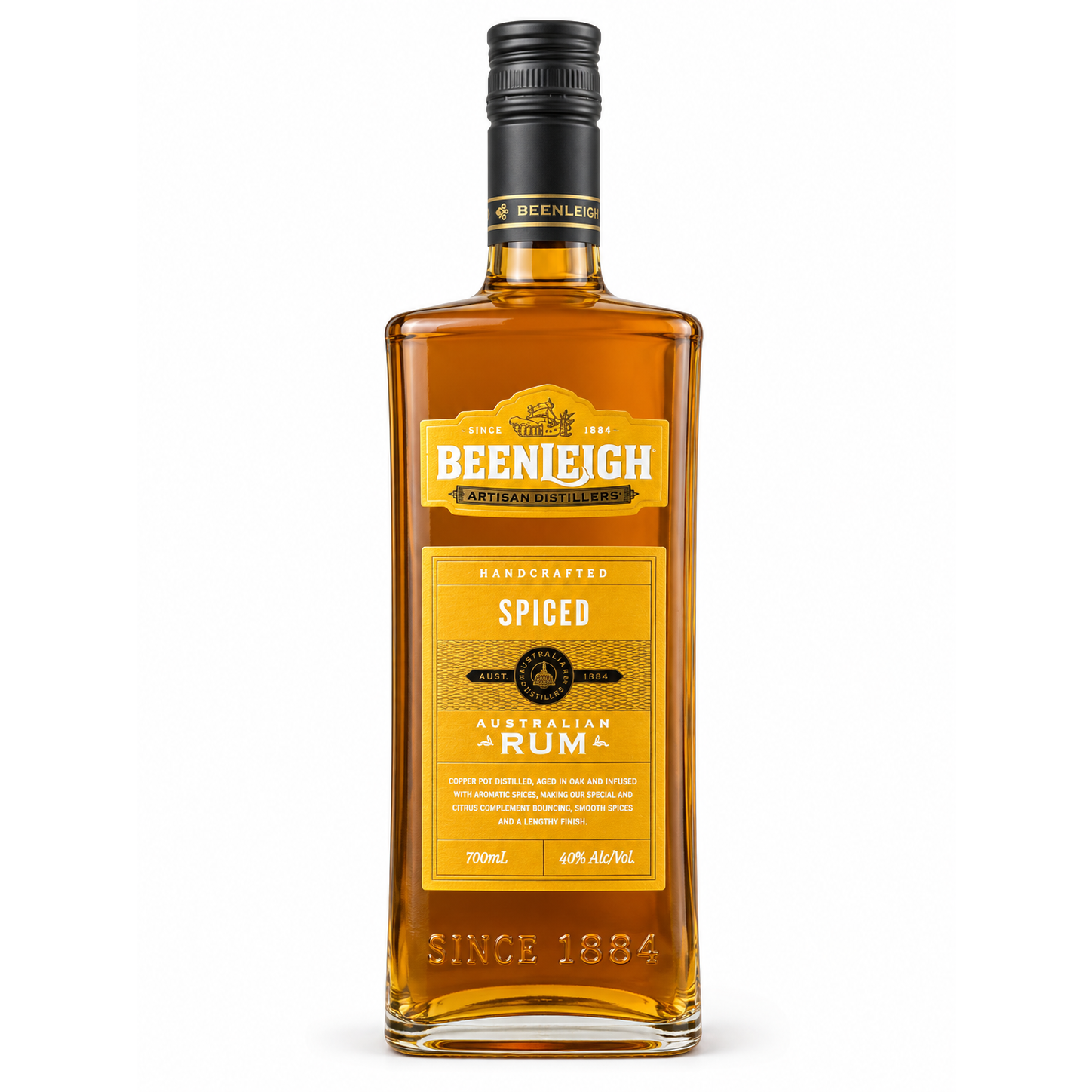 A 700ml bottle of Beenleigh Handcrafted Spiced Australian Rum, featuring a clear glass bottle filled with amber liquid, a yellow and black label, and a black screw cap, set against a plain white background.