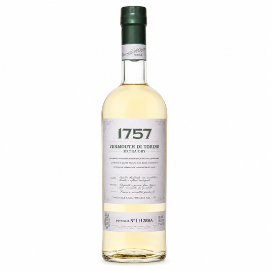 A bottle of 1757 Vermouth di Torino Extra Dry white wine, featuring a pale golden liquid, a white label with black and green text, and a dark green cap, set against a plain white background.