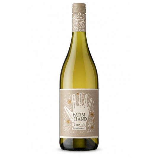 A bottle of Farm Hand Organic Chardonnay white wine, featuring a dark green glass bottle with a beige label and a matching beige foil capsule, set against a plain white background.