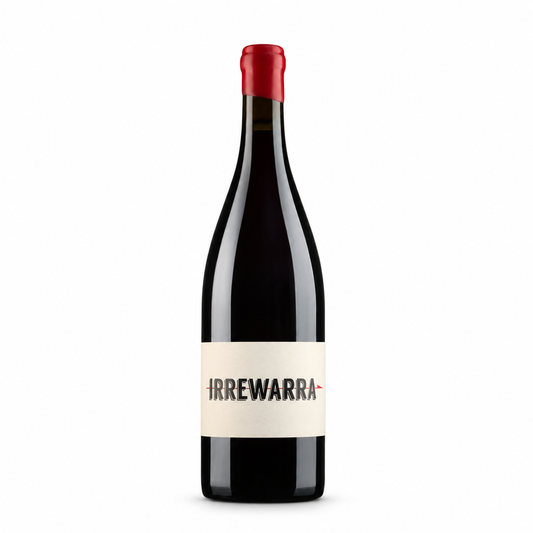A bottle of Irrewarra Pinot Noir red wine with a dark glass body, a cream-colored label with black text, and a red foil capsule at the top, set against a plain white background.