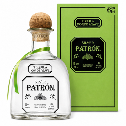 A bottle of Silver Patrón tequila with a cork stopper and green ribbon, shown in front of its bright green packaging box on a white background.