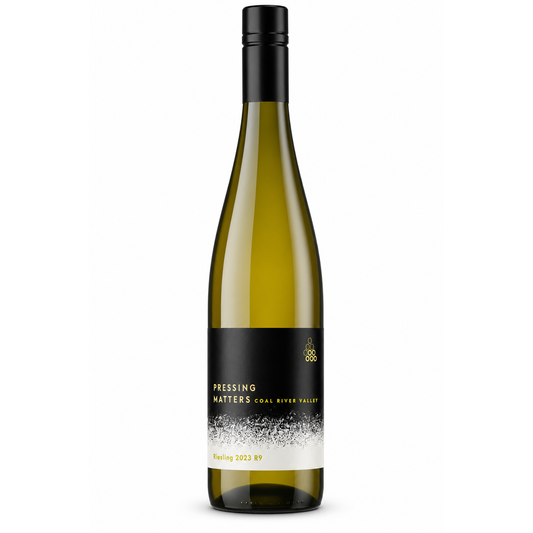A bottle of Pressing Matters Coal River Valley Riesling white wine, featuring a dark green glass bottle, a black screw cap, and a black label with gold and white text and graphics, set against a plain white background.